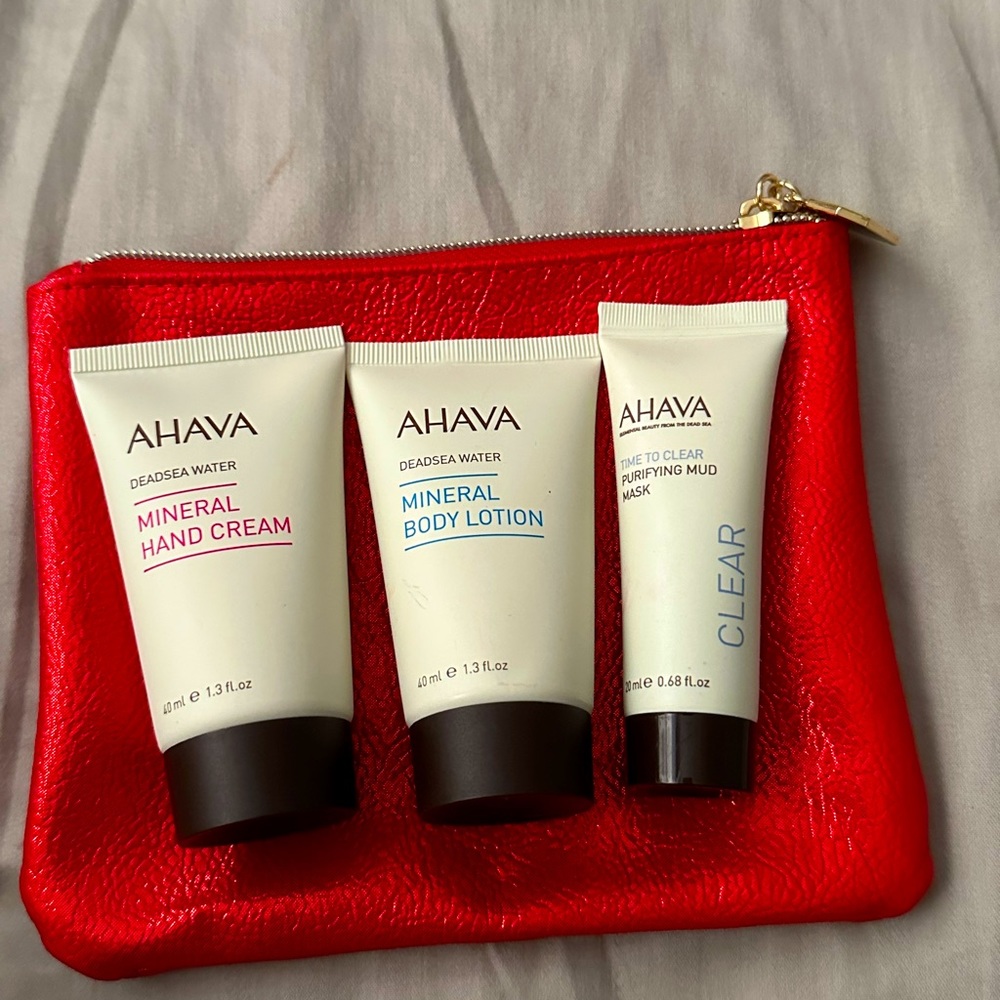 AHAVA 3 medium sized package with cute red bag.Hand cream,body lotion,mud mask.